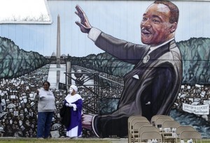 People march Monday Jan. 18, 2016, before the Martin Luther King, Jr. March in San Antonio, Texas. Marches, speeches and concerts were part of celebrations across Texas to remember slain civil rights leader Martin Luther King Jr. on the federal holiday.  (John Davenport/The San Antonio Express-News via AP) RUMBO DE SAN ANTONIO OUT; NO SALES; MANDATORY CREDIT