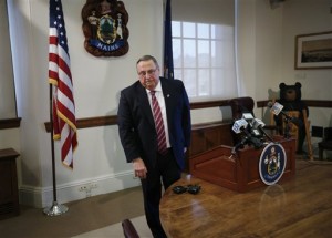 Gov. Paul LePage leaves a news conference at the State House, Friday, Jan. 8, 2016, in Augusta, Maine. LePage answered questions concerning his recent remarks about drug dealers were coming to Maine to impregnate white girls." The Republican governor apologized for his remark, saying it was a slip of the tongue. (AP Photo/Robert F. Bukaty)