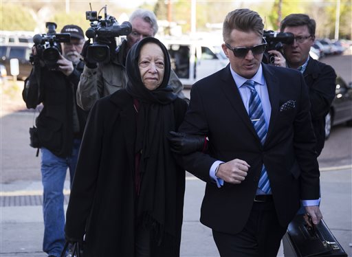 Prince's half-sister Norrine Nelson, in black, arrives at the Carver County Justice Center in Chaska Chaska, Minn., Monday, May 2, 2016. With the approval of most of Princes siblings, Carver County District Court Judge Kevin Eide confirmed the appointment of Bremer Trust, National Association as special administrator to manage the late musicians assets during a probate hearing. (Leila Navidi/Star Tribune via AP)